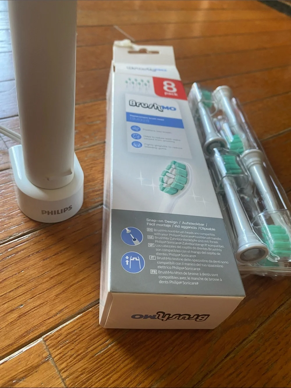 Philips Sonicare White Electric Toothbrush Handle with Replacement Brush Heads